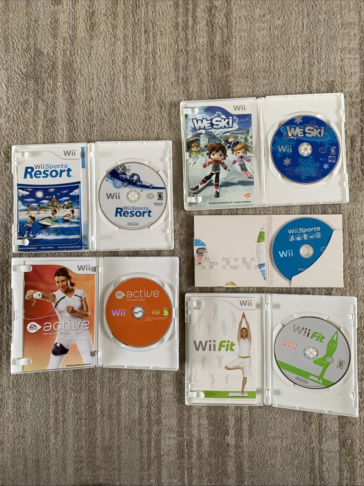Nintendo Wii Bundle 2 MotionPlus Remotes Wii Sports Resort Fit Active We Ski