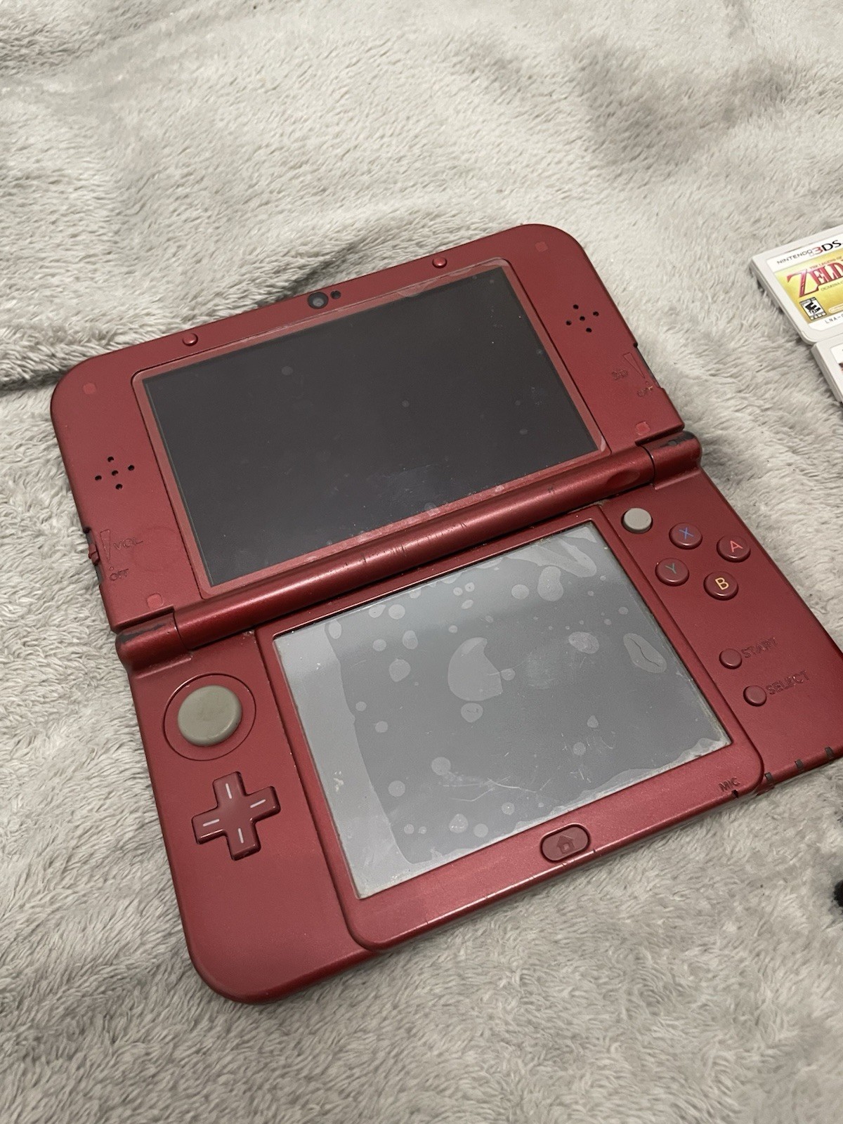 Nintendo 3DS XL (Red) with pouch and lots of games