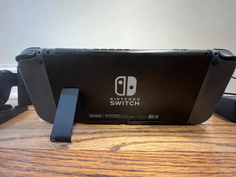 Nintendo Switch 32GB Console with Gray Joy‑Cons and Smash Bros. Dock