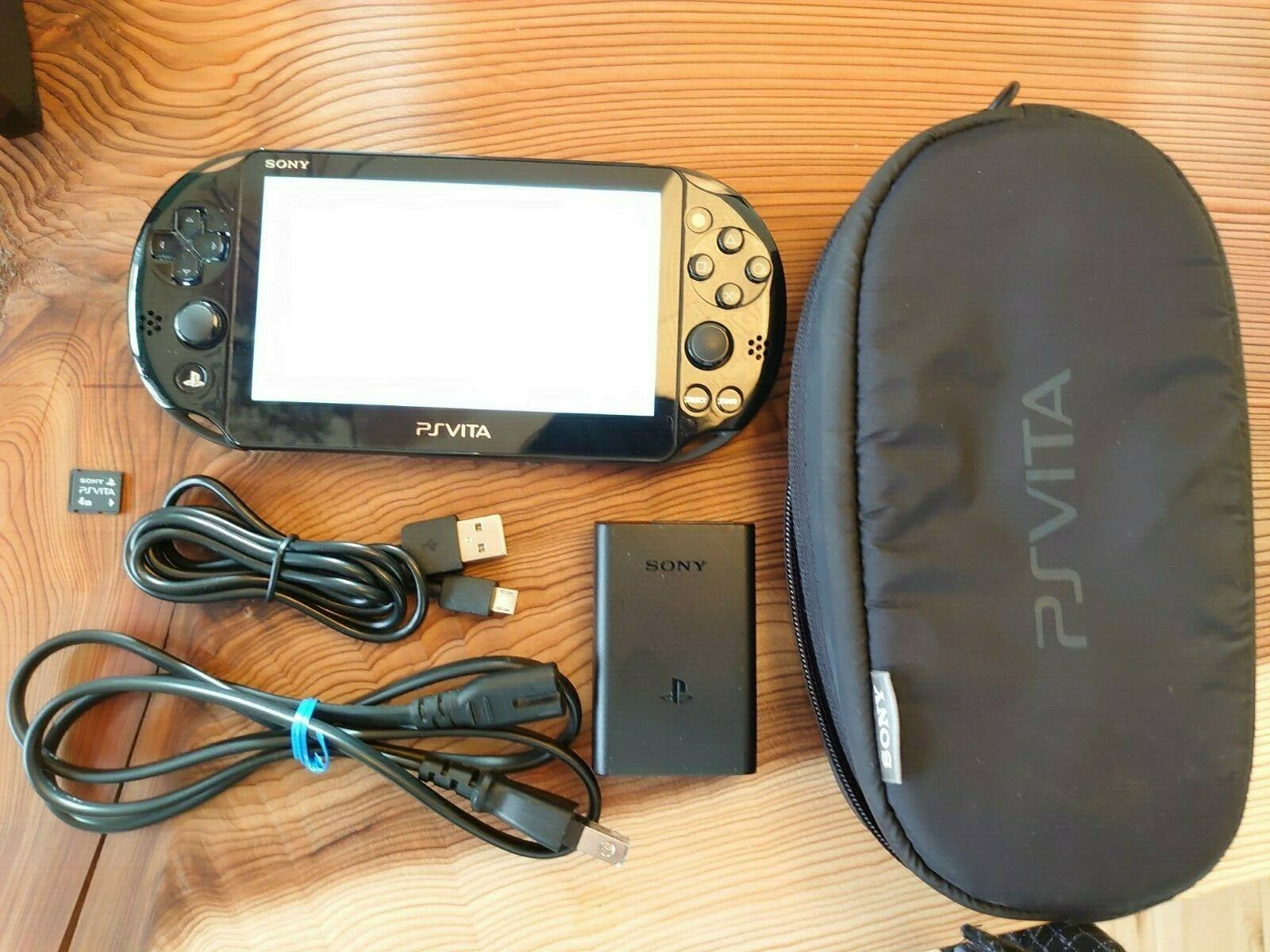Sony PS Vita PCH-2000 ZA11 slim Black Console with Charger, 4GB memory, Pouch