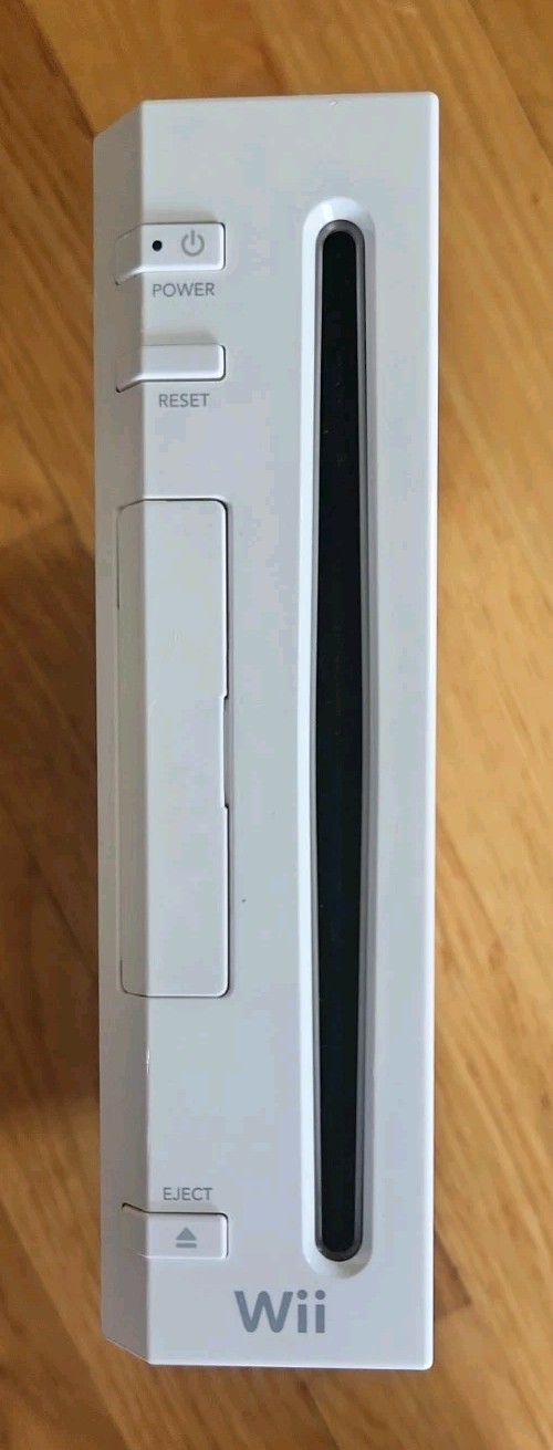Nintendo Wii Console Bundle: 2 Remotes 2 Nunchucks, All Cords, 4 Games & Stand