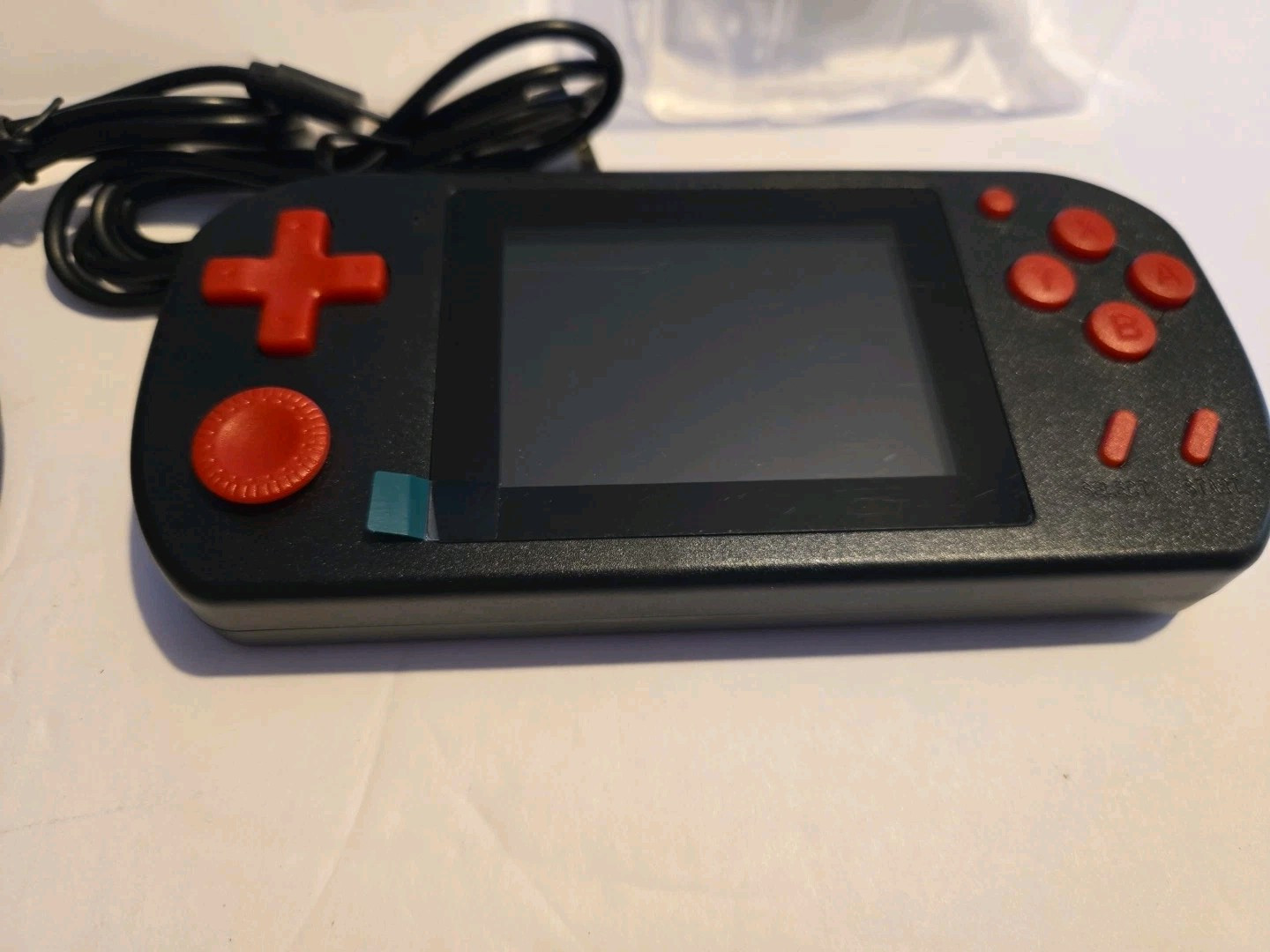 A Red Retro Classic Games Handheld And TV Small Game Console With Many Games