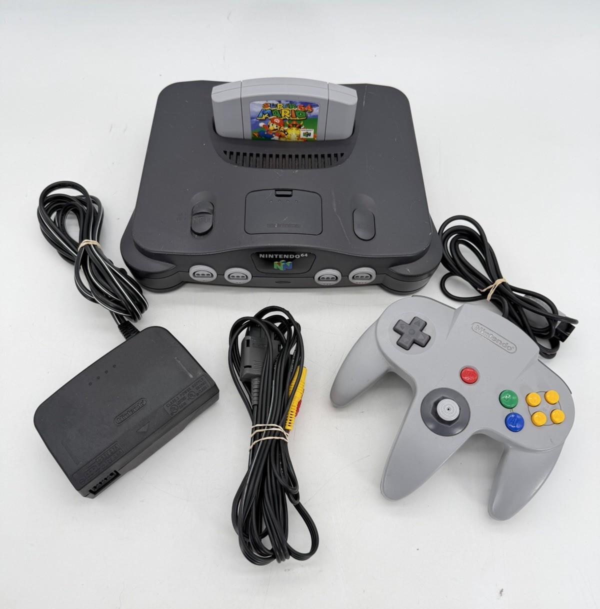Nintendo N64 Black Console OEM Bundle W/ Super Mario 64 Tight Controller Tested