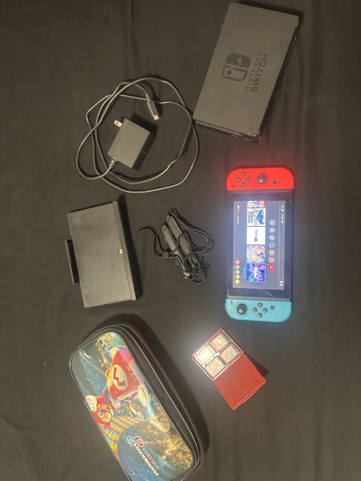 Nintendo Switch console bundle with games and accessories, excellent condition