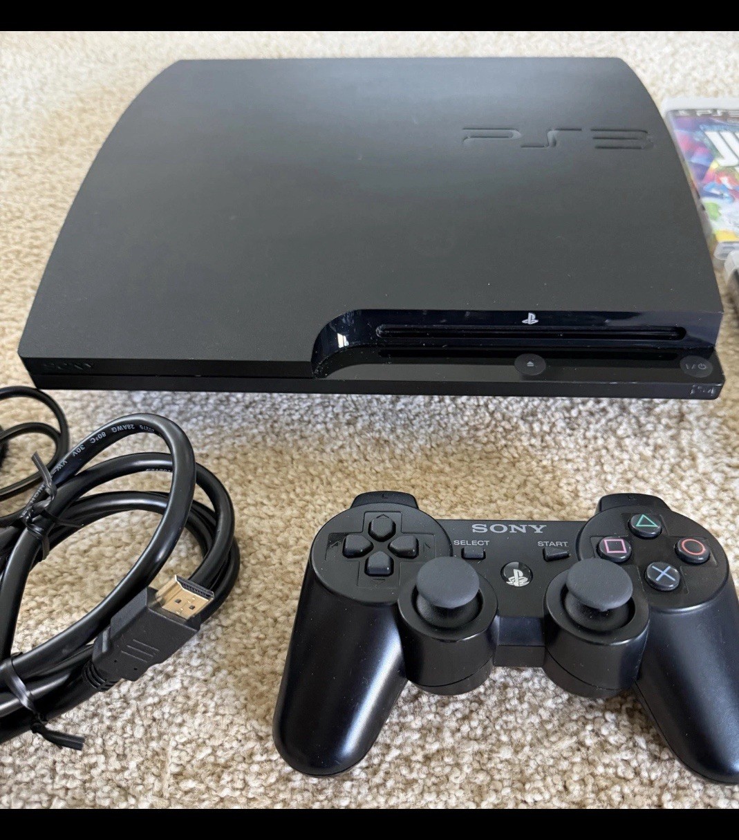 Sony PlayStation 3 Slim Edition 320GB Console – Charcoal Black has hen installe