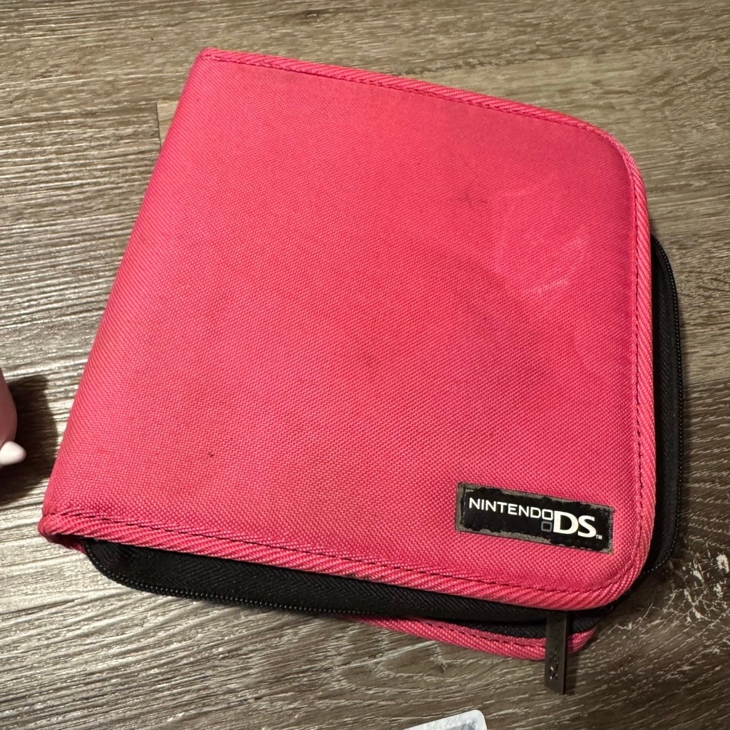 Nintendo DSi Handheld Console Blue With Pink Case and Games Bundle
