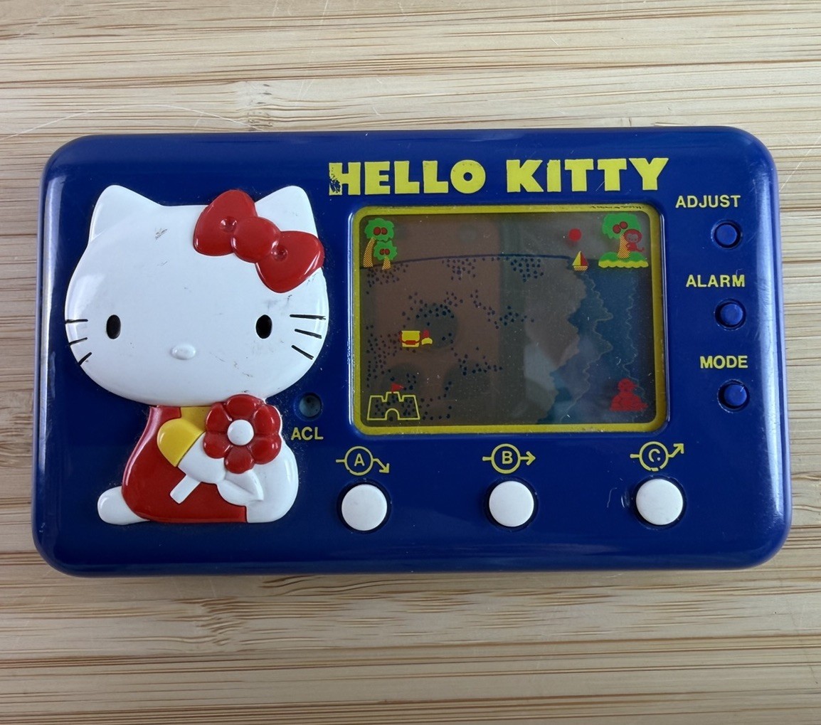LCD HELLO KITTY Handheld Console System Tomy Game Watch