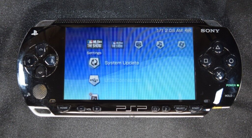 Sony PlayStation Portable Value Pack – Black (PSP-1001K) With Games/Movies NO SD