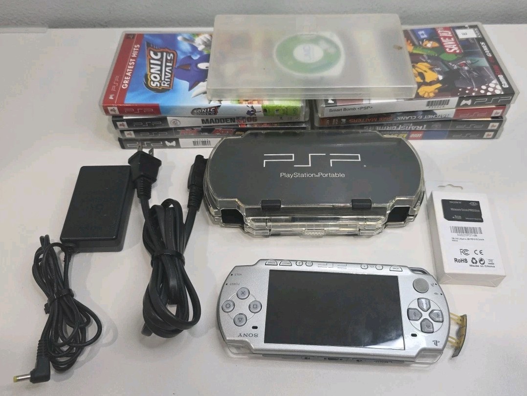Sony PSP 2001 Bundle Silver With 9 Games Comes With Brand New Battery And Case