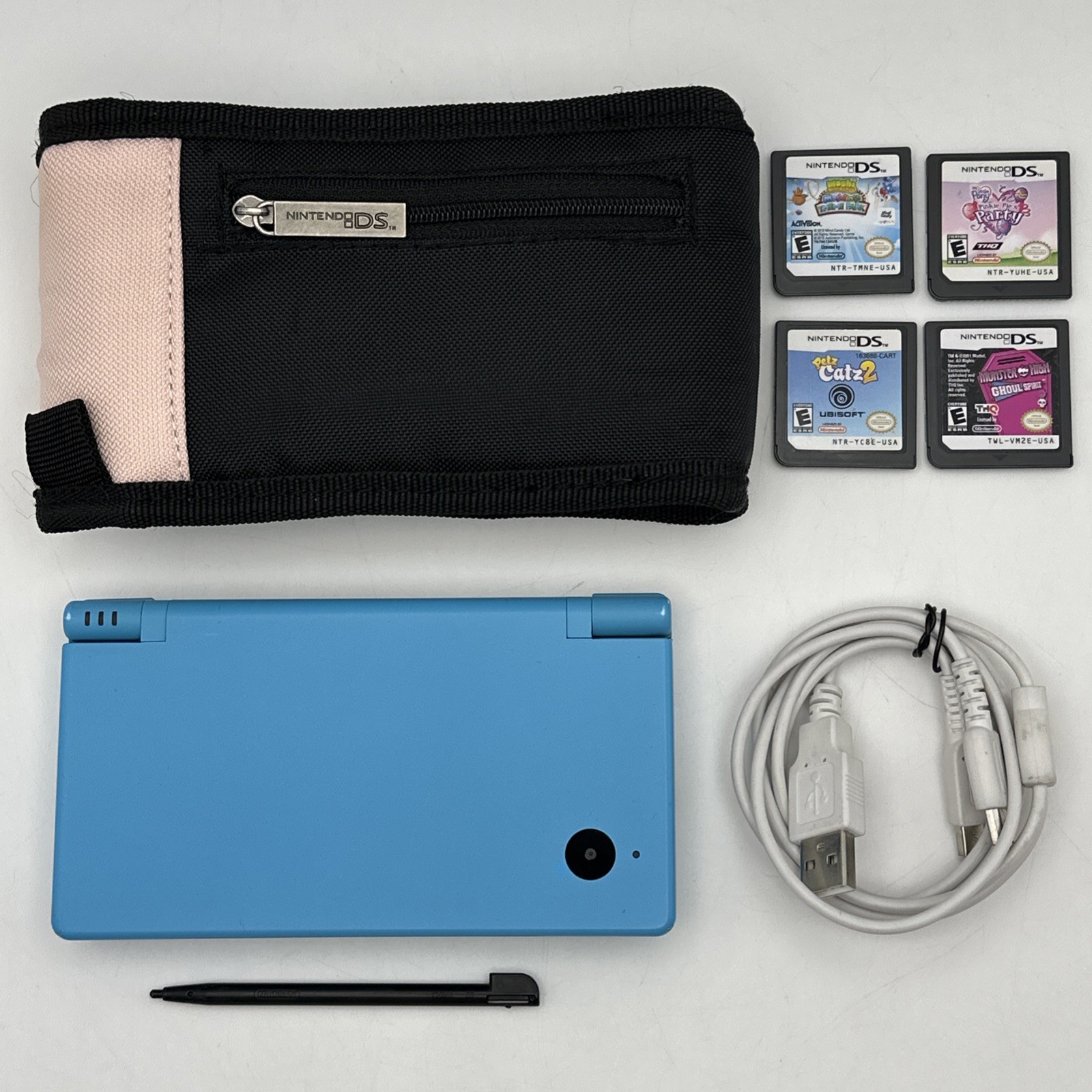 Nintendo DSi Blue Handheld Console C/TWL-USA-1 w/ 4 Games Case Stylus & Charger