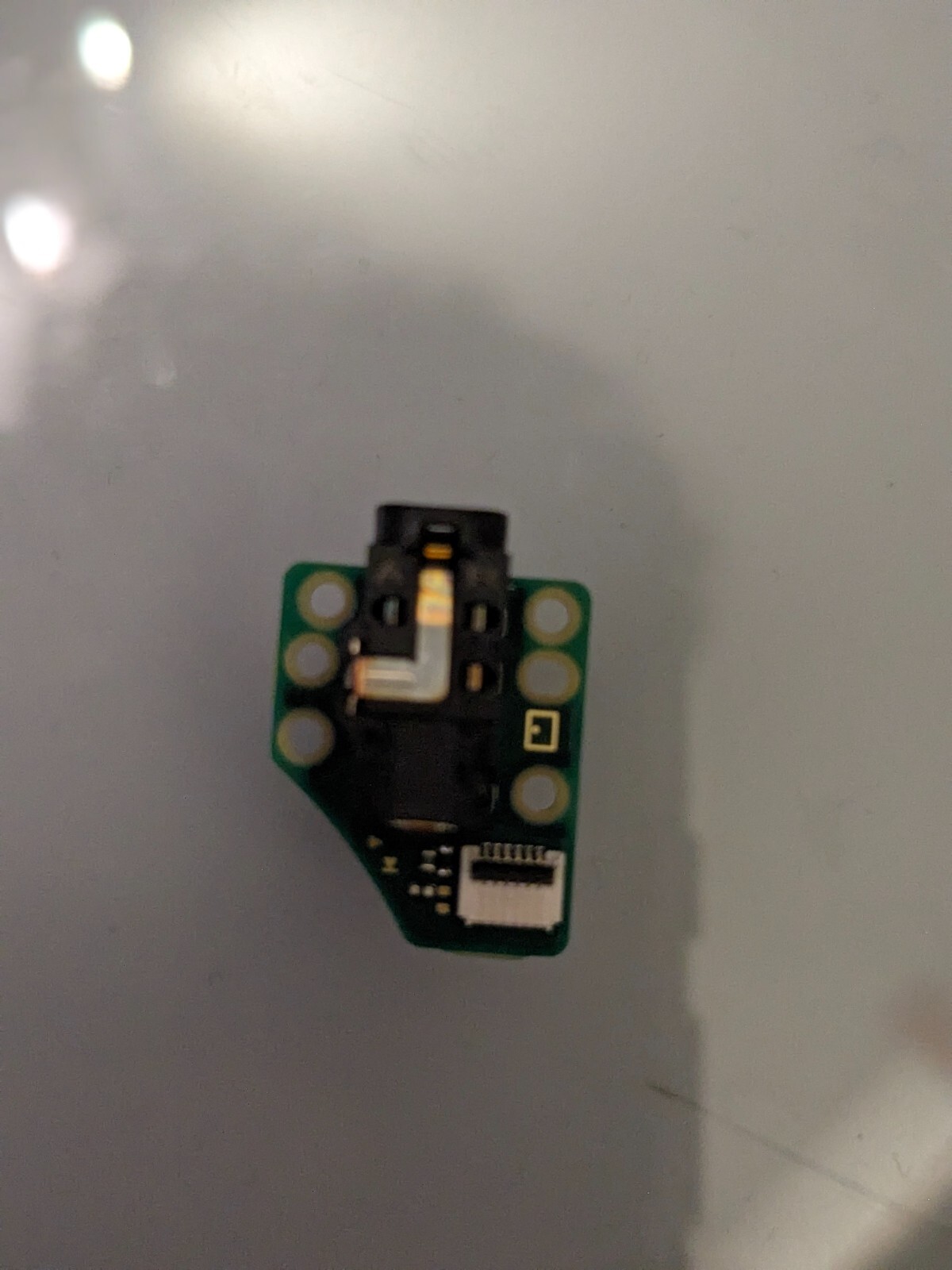 Nintendo Switch Lite game card reader and headphone jack