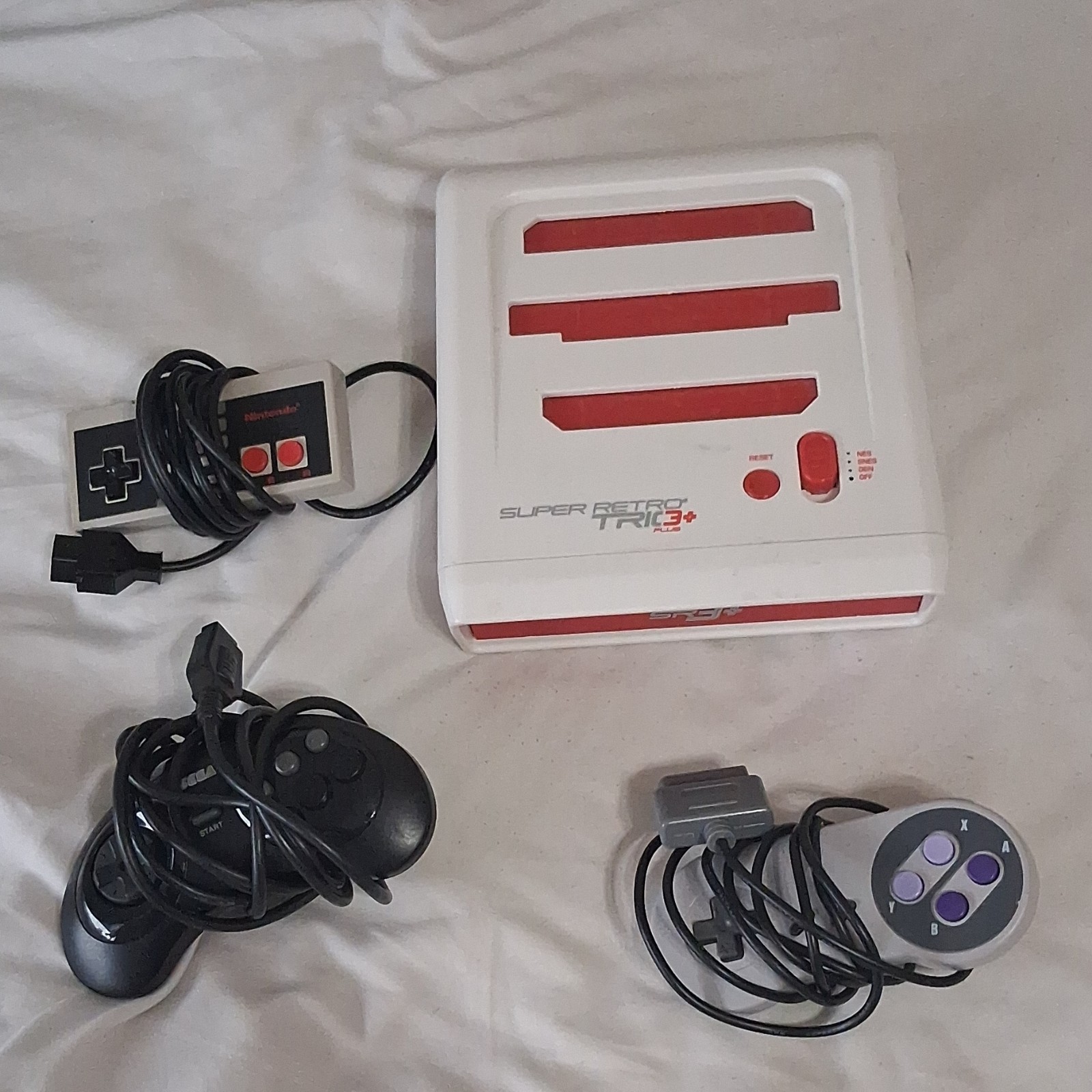 super retro trio 3 plus red and white with controllers