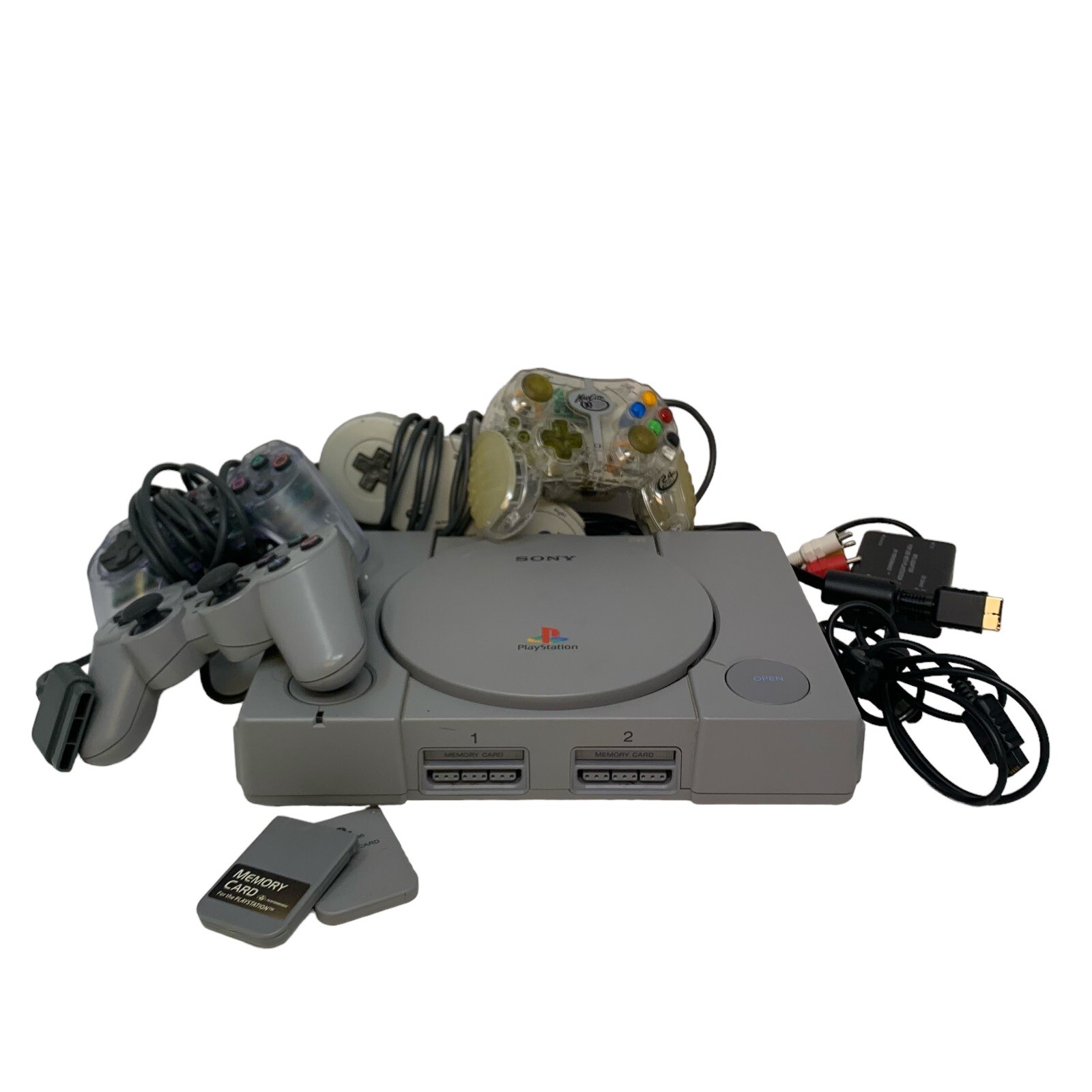 PlayStation System PS1 Bundle Cords 4 DualShock Controllers 2 Memory Cards