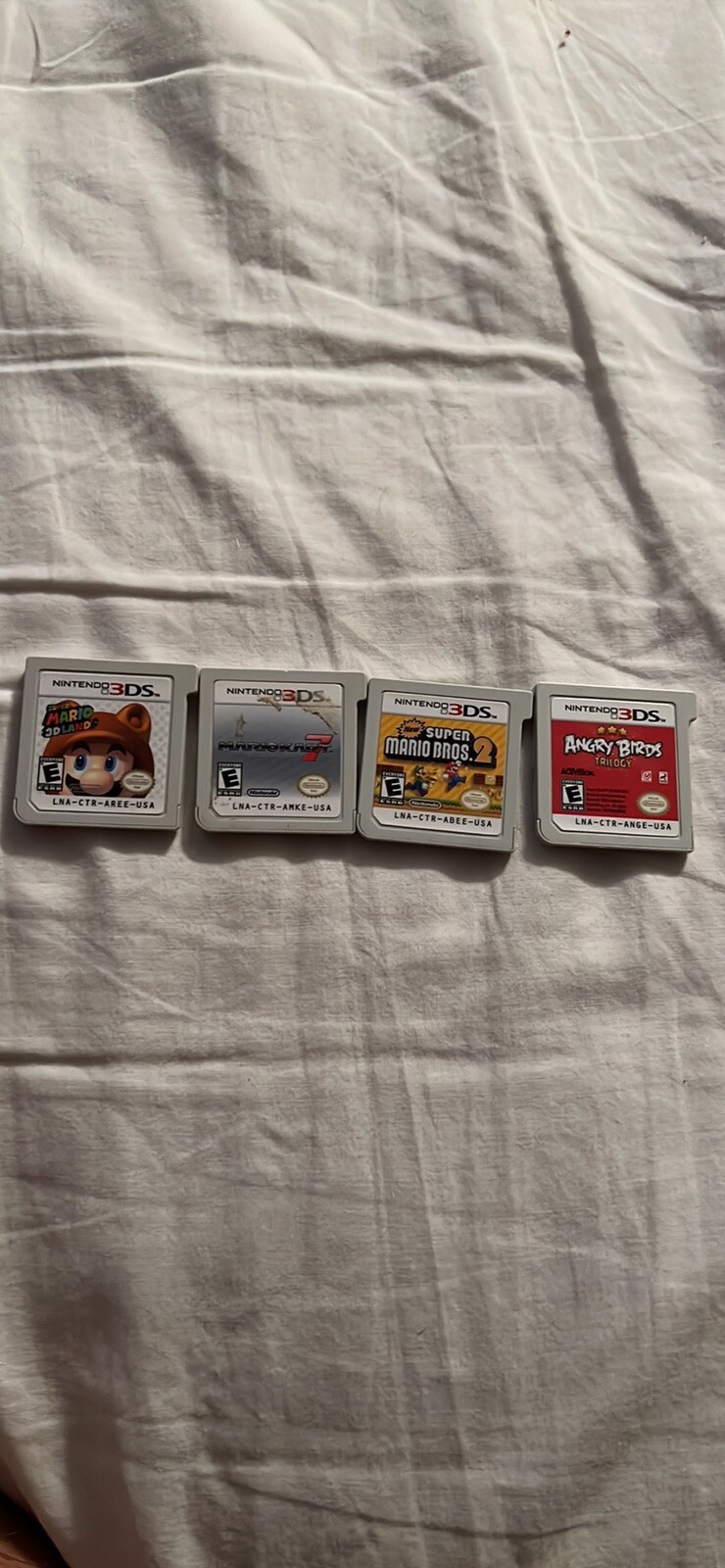 Nintendo 3DS Launch Edition Handheld System – Cosmo Black, 4 3ds Games, Charger.