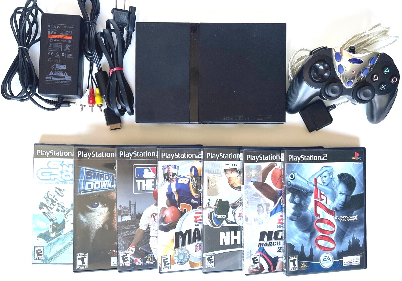 SONY PLAYSTATION 2 SLIM CONSOLE BUNDLE WITH INTEC CONTROLLER, 7 GAMES IN PS2 BOX