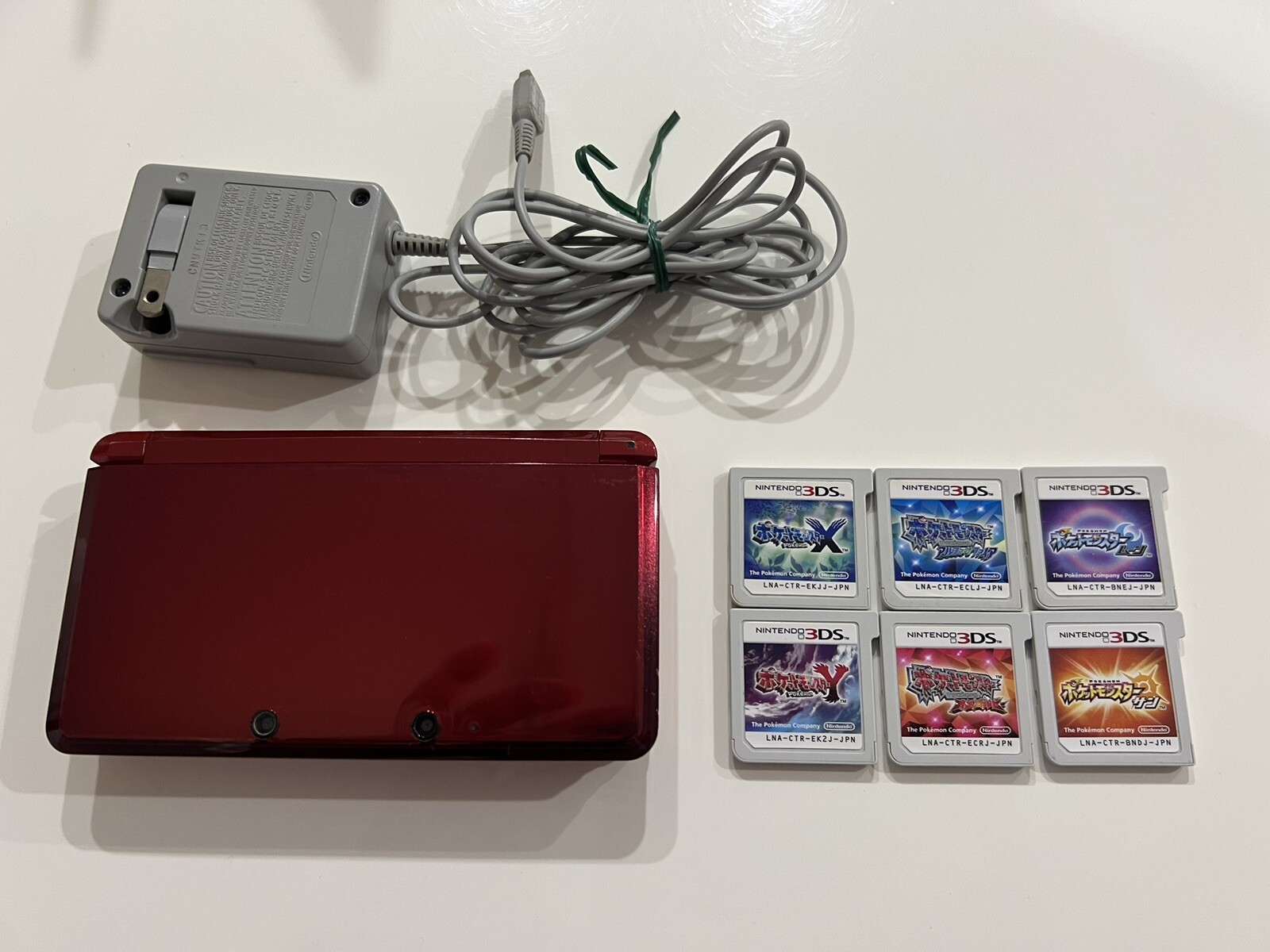 Nintendo 3DS Red Console & Pokemon X Y Sun Moon Omega Ruby Alpha Sapphire 6 set