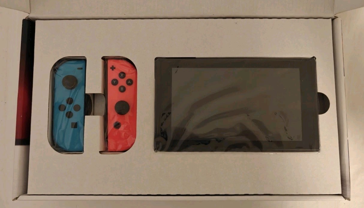 Nintendo Switch 32GB Console with Neon Red and Neon Blue Joy-Con *USED ONCE*