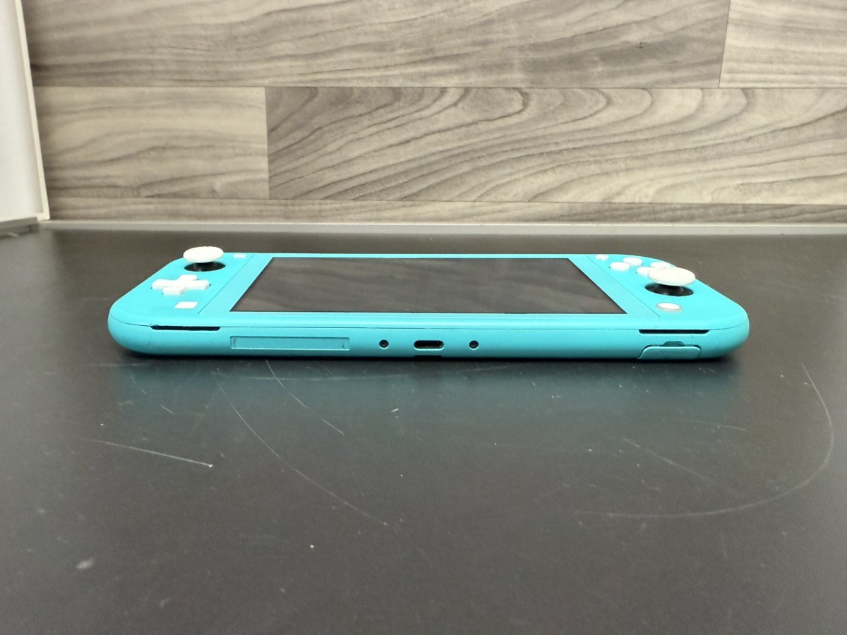 Nintendo Switch Lite 32GB Handheld Console – Compact Design, Built-I (A1D027231)