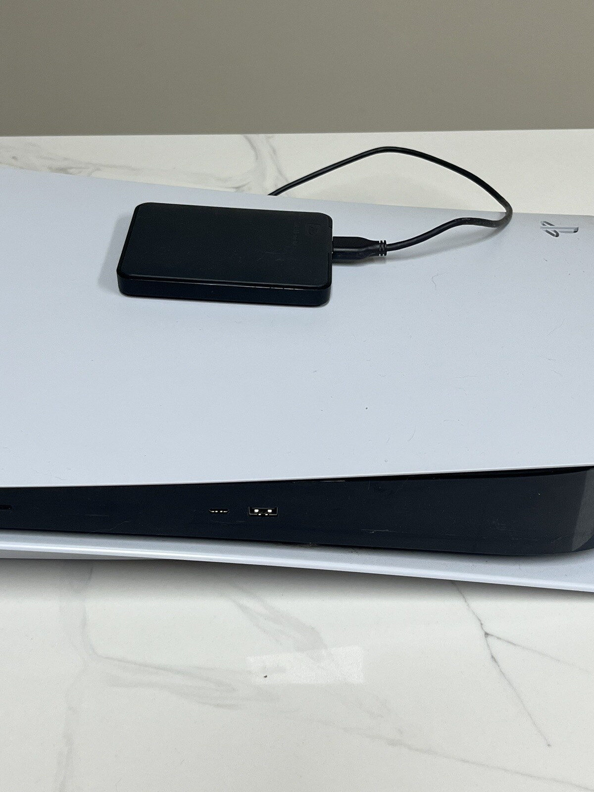 ps5 console disc version with games, controller, and 2Tb external hard drive