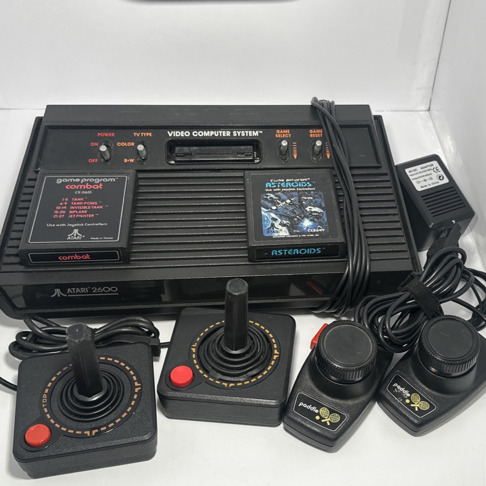 Atari 2600 Black Console RF w/ Joysticks, Paddle Controllers, Combat, Asteroids