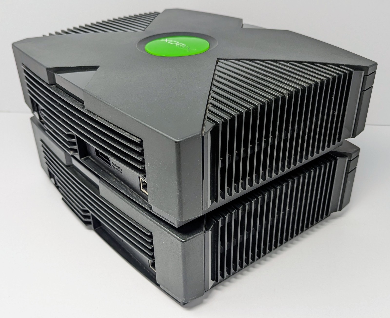 2 Original Microsoft Xbox Consoles – Powers On – For Parts Or Repair