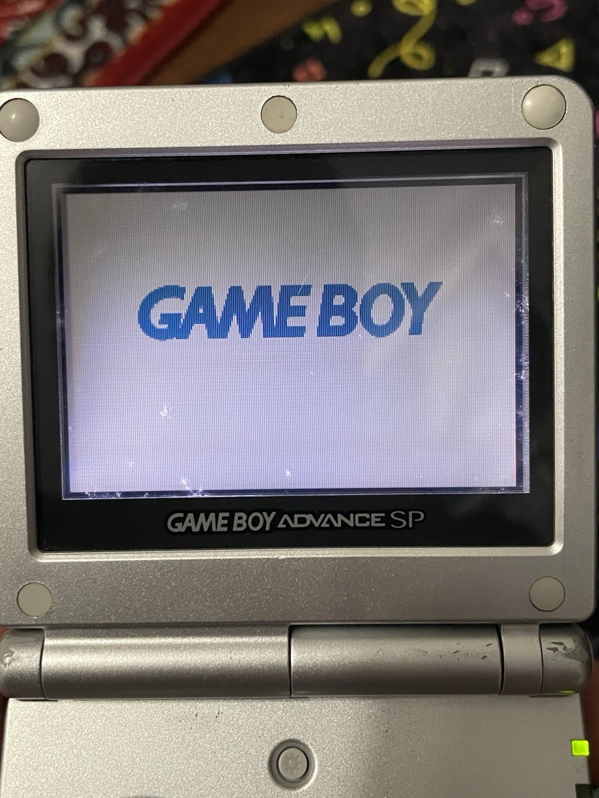 Nintendo Gameboy Advance SP • silver • with carrying case and game