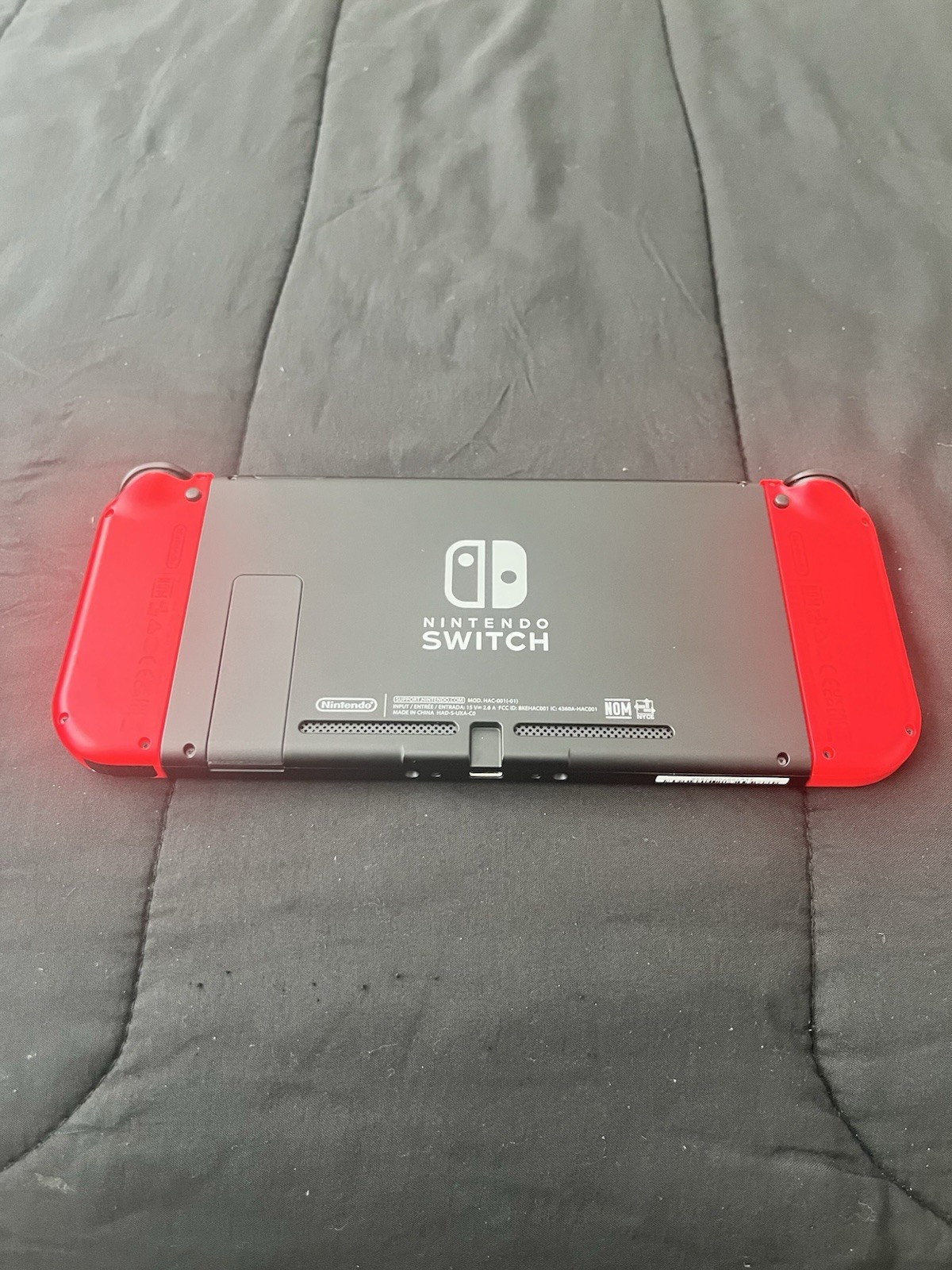 Nintendo Switch Console with Neon Blue and Red Joy-Con Controllers Barely Used