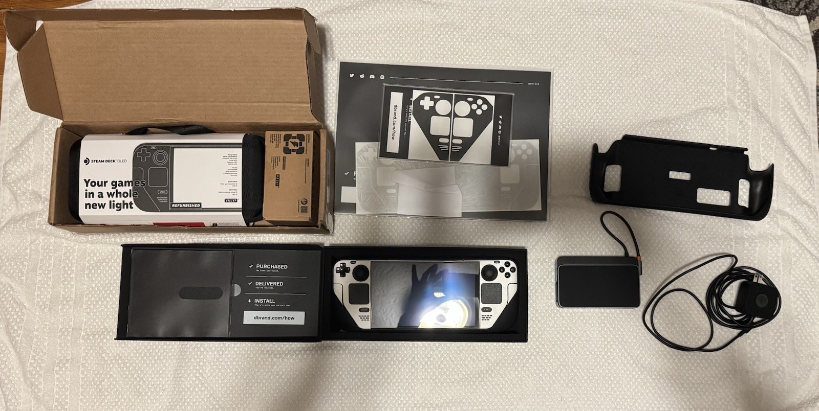 Valve Steam Deck OLED 1TB Bundle – dbrand Killswitch, Dock, Skull & Co Cases