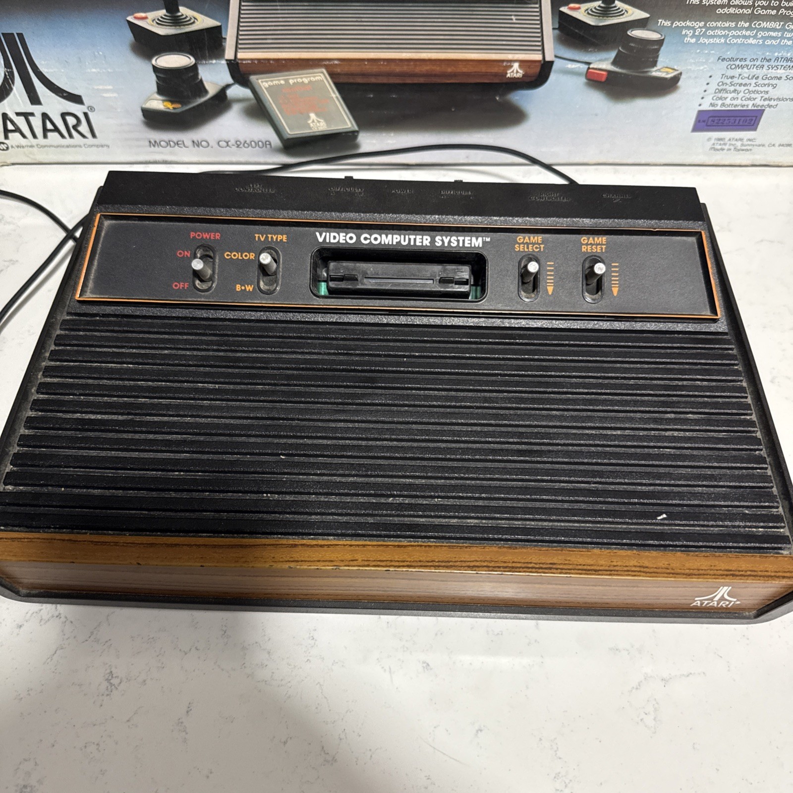 Atari 2600 Woodgrain CIB Complete Working Matching Serial 21 Games Paddles