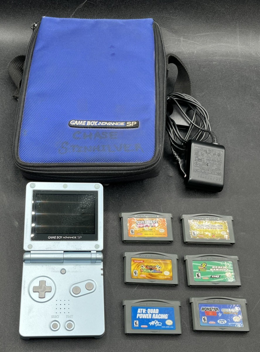 NINTENDO GAME BOY ADVANCE SP AGS-101 PEARL BLUE W/ 6 GAMES & CHARGER (MVP036525)