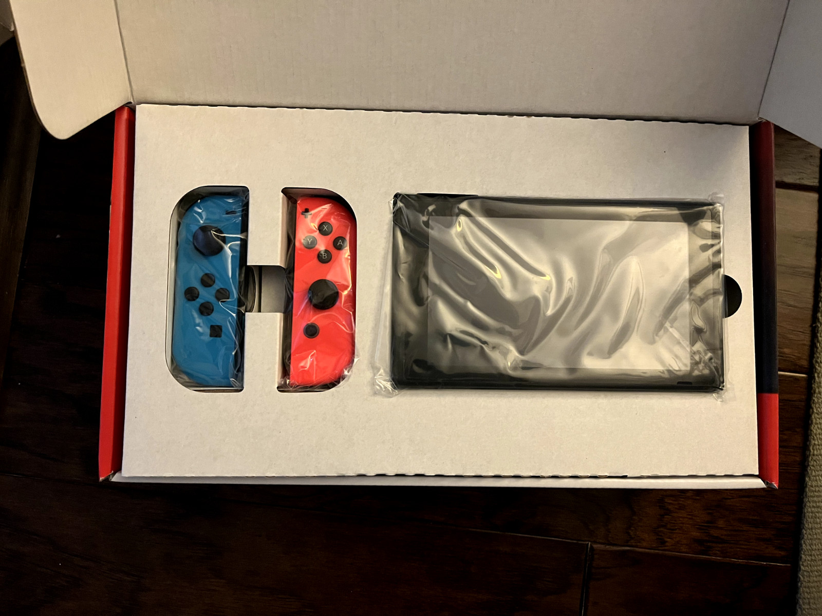 Nintendo Switch 32GB Handheld Console – Neon Red/Neon Blue