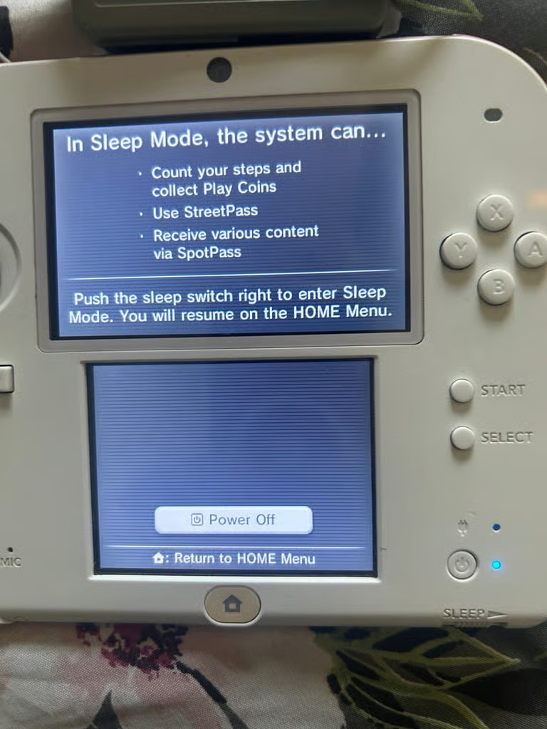 Nintendo 2DS red and white, console with charger came with super Mario bros