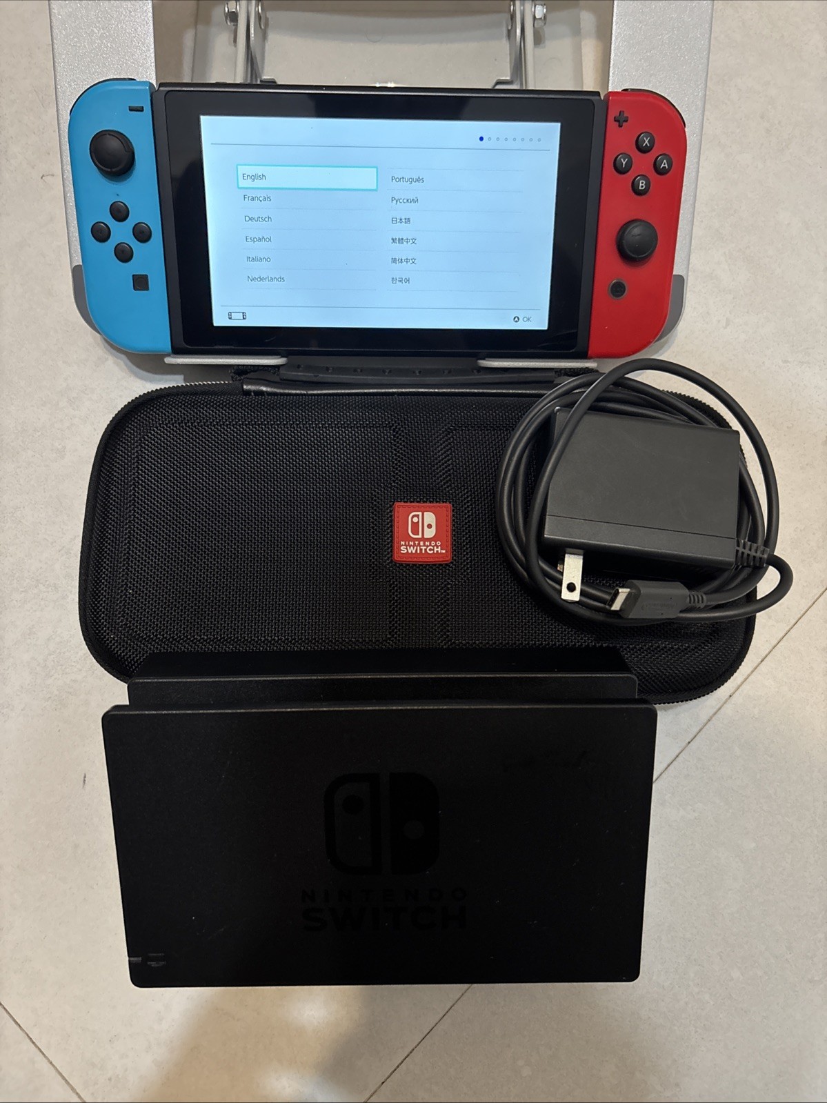 Nintendo Switch™ with Blue And Red JoyCons, Charging Cord – Bundle
