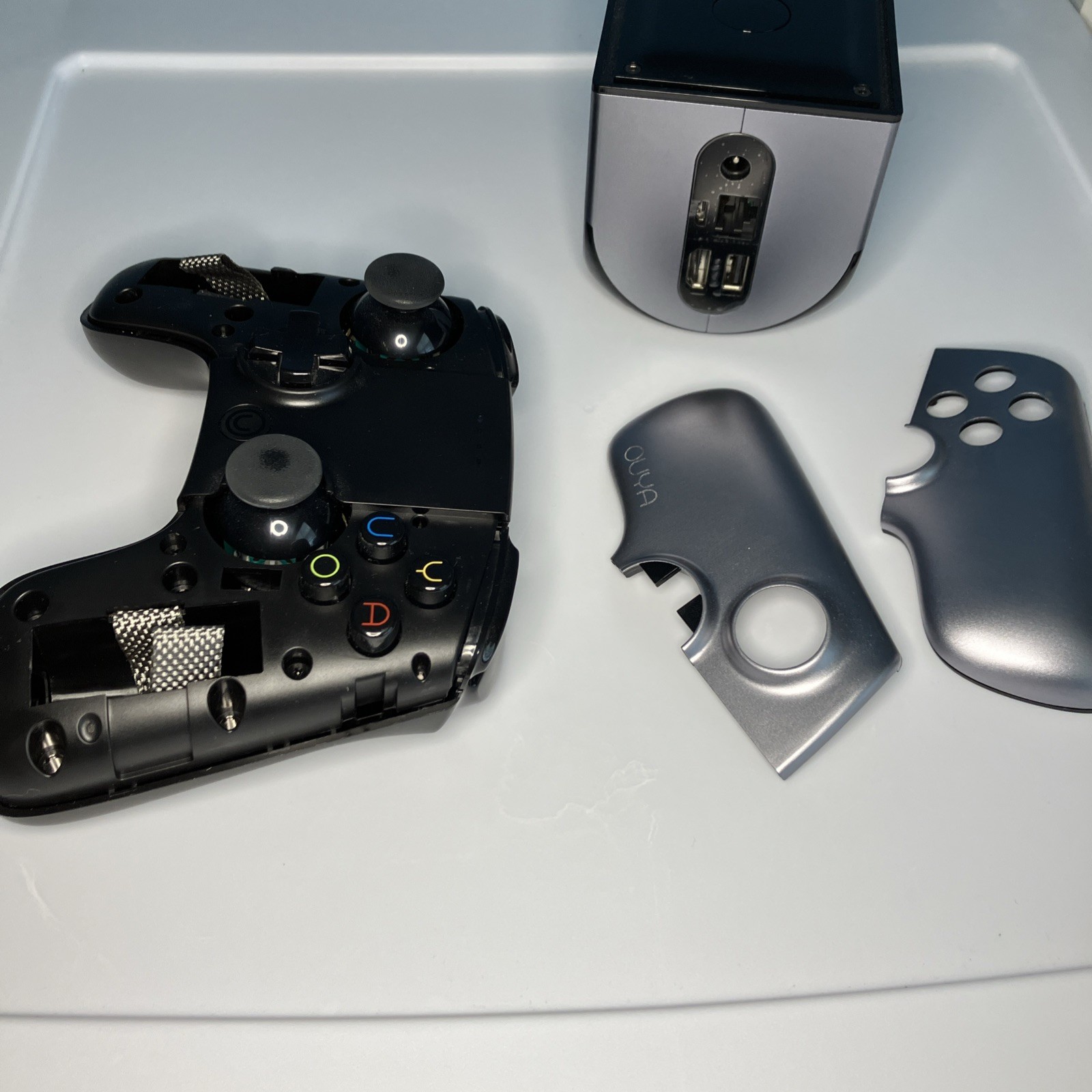 OUYA Silver Console With Controller, HDMI, & power cord In Original Box