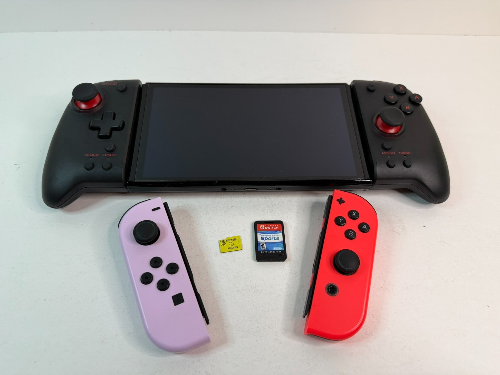 Nintendo Switch OLED HEG-001 Handheld + Split Pad Pro + 256GB MicroSD + Game