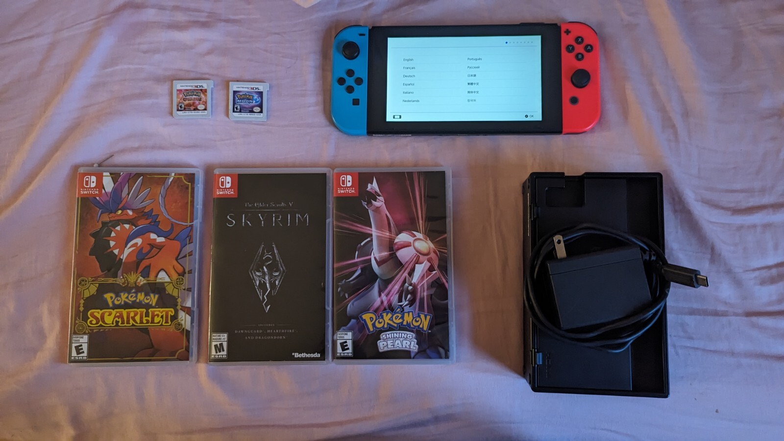 FIRST EDITION – Nintendo Switch 32GB / Red Blue Joycons/ Gray Console With Games