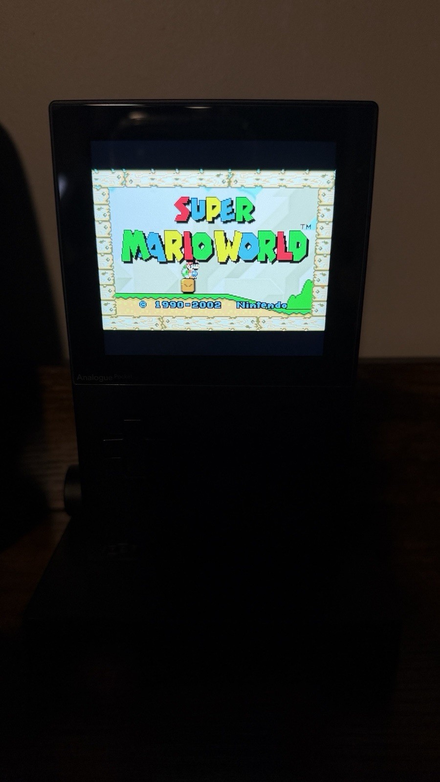 Analogue Pocket + Dock + Case + Screen Protector + Super Mario Advance.