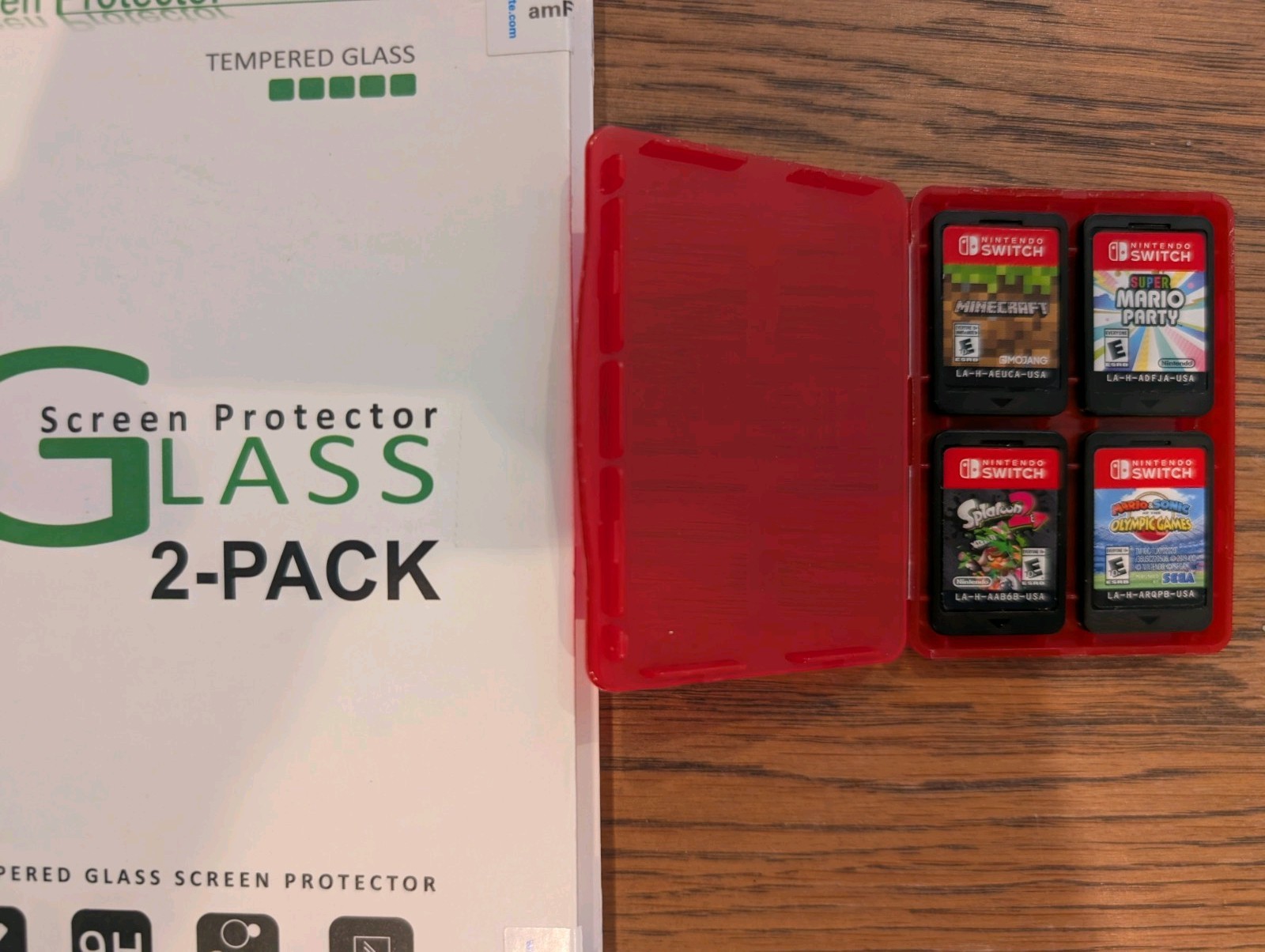 Nintendo Switch OLED Red Blue in Excellent Condition w/ Games, Travel Case