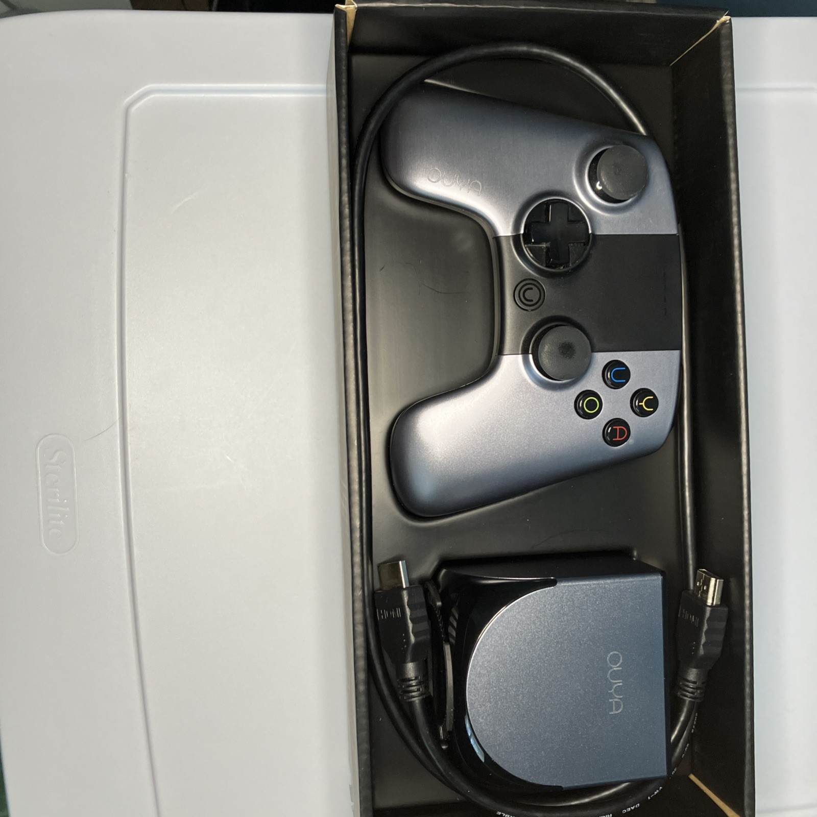 OUYA Silver Console With Controller, HDMI, & power cord In Original Box
