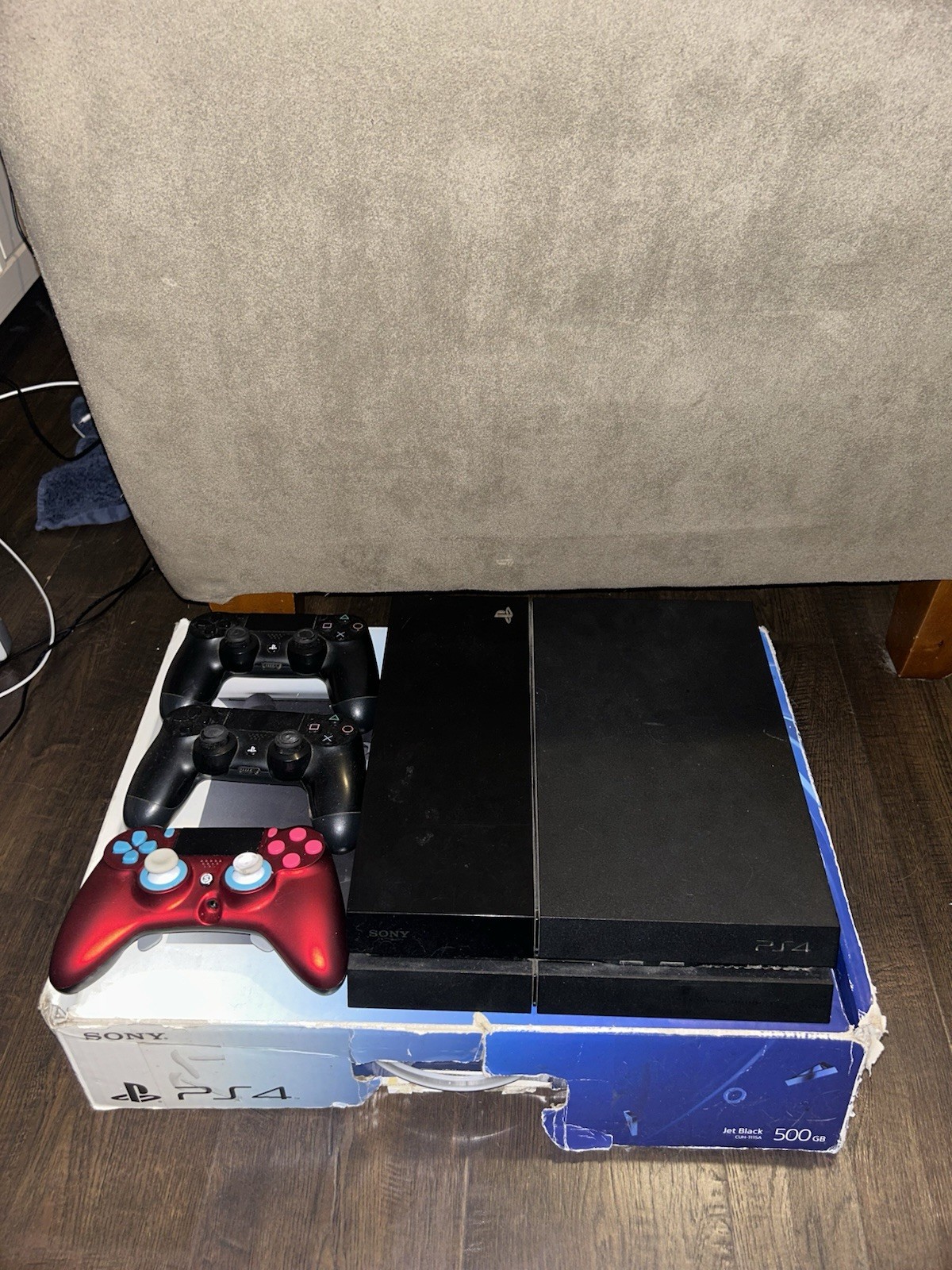 Sony PlayStation 4 Home Console – Black with cables