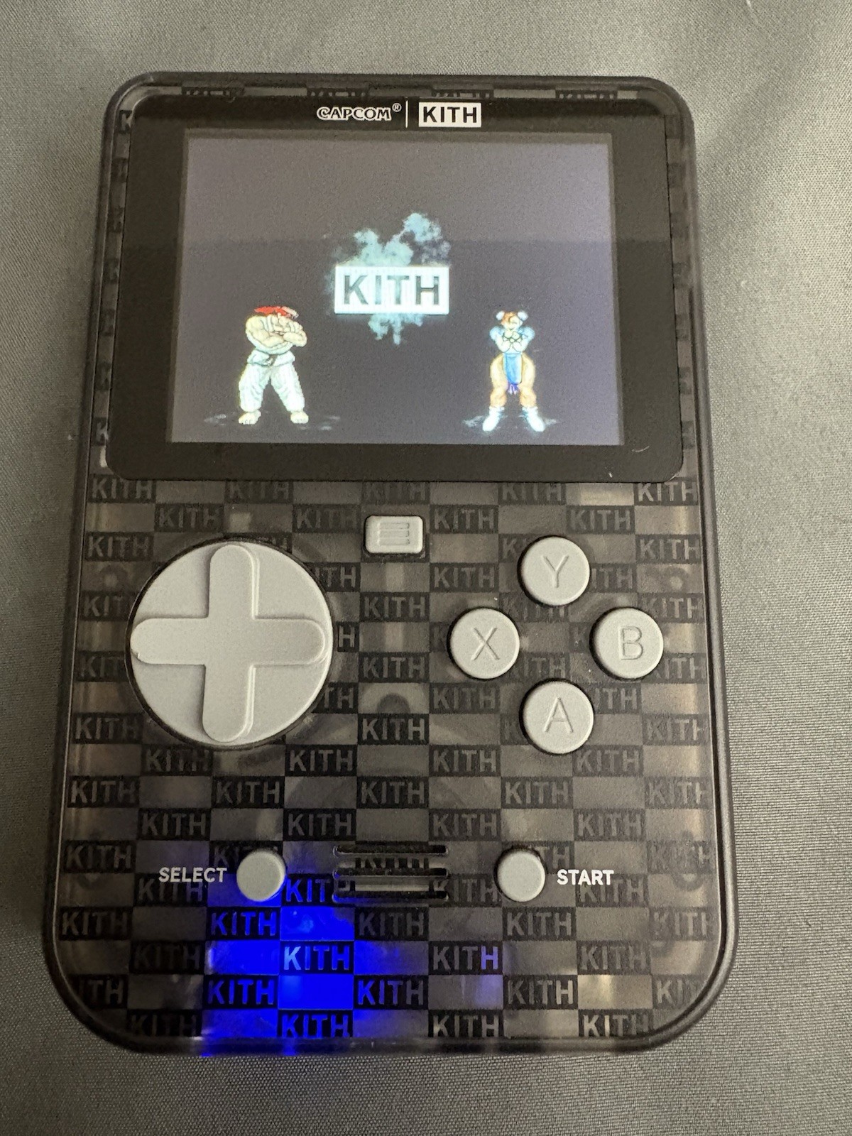 CAPCOM x KITH FOR HYPER MEGA TECH SUPER POCKET HANDHELD CLEAR CONSOLE