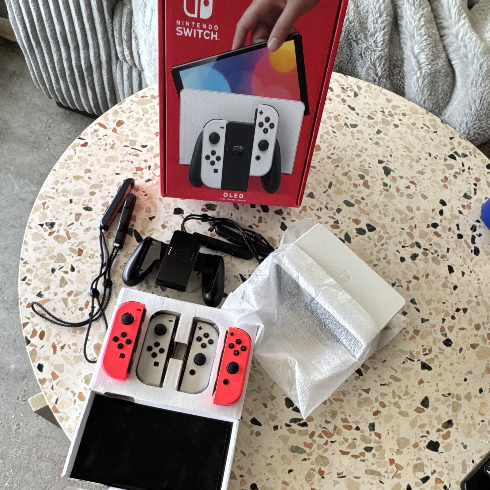 Nintendo Switch OLED 64GB White Console w/ Joy-Cons, Extra Red Joy-Con, Box