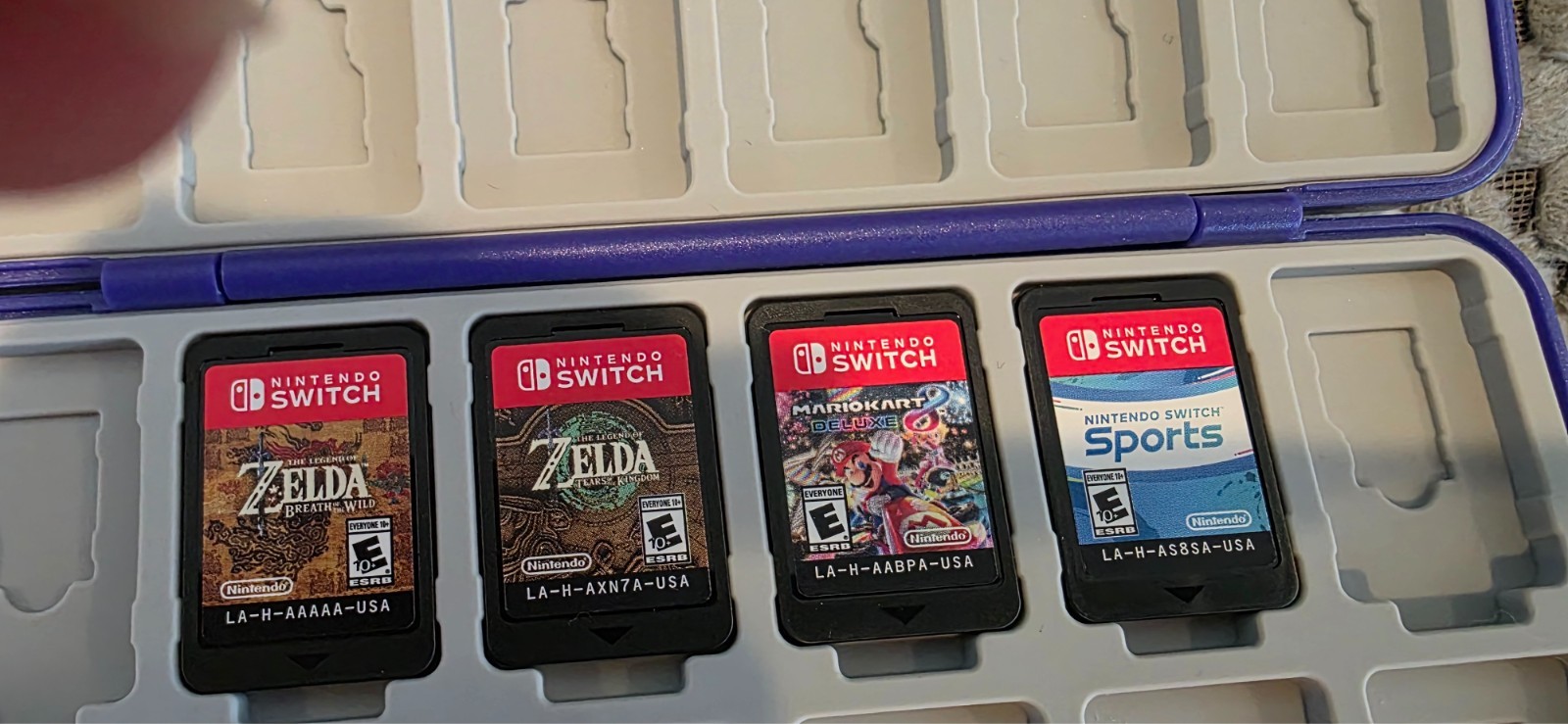 Nintendo Switch Bundle with different types of controllers, games, backpack and