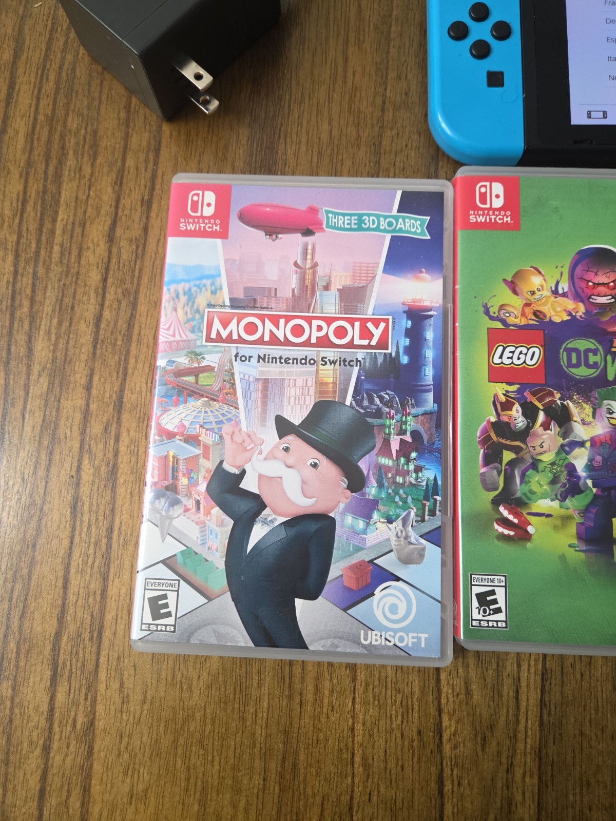 Nintendo Switch Console with Neon Red and Blue Joy-Cons, Plus Games