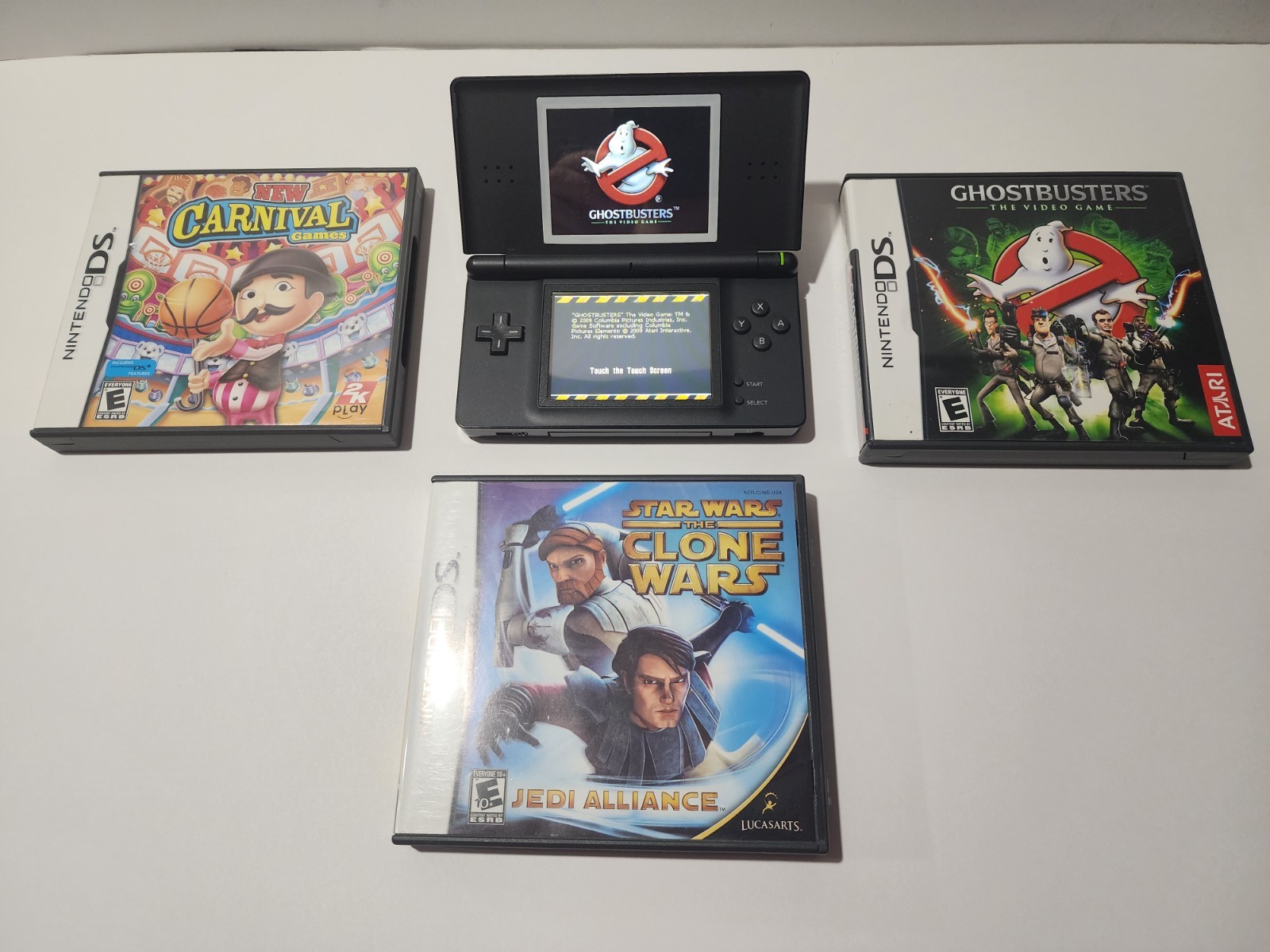 Nintendo DS Lite Handheld System – Onyx Black with 3 games