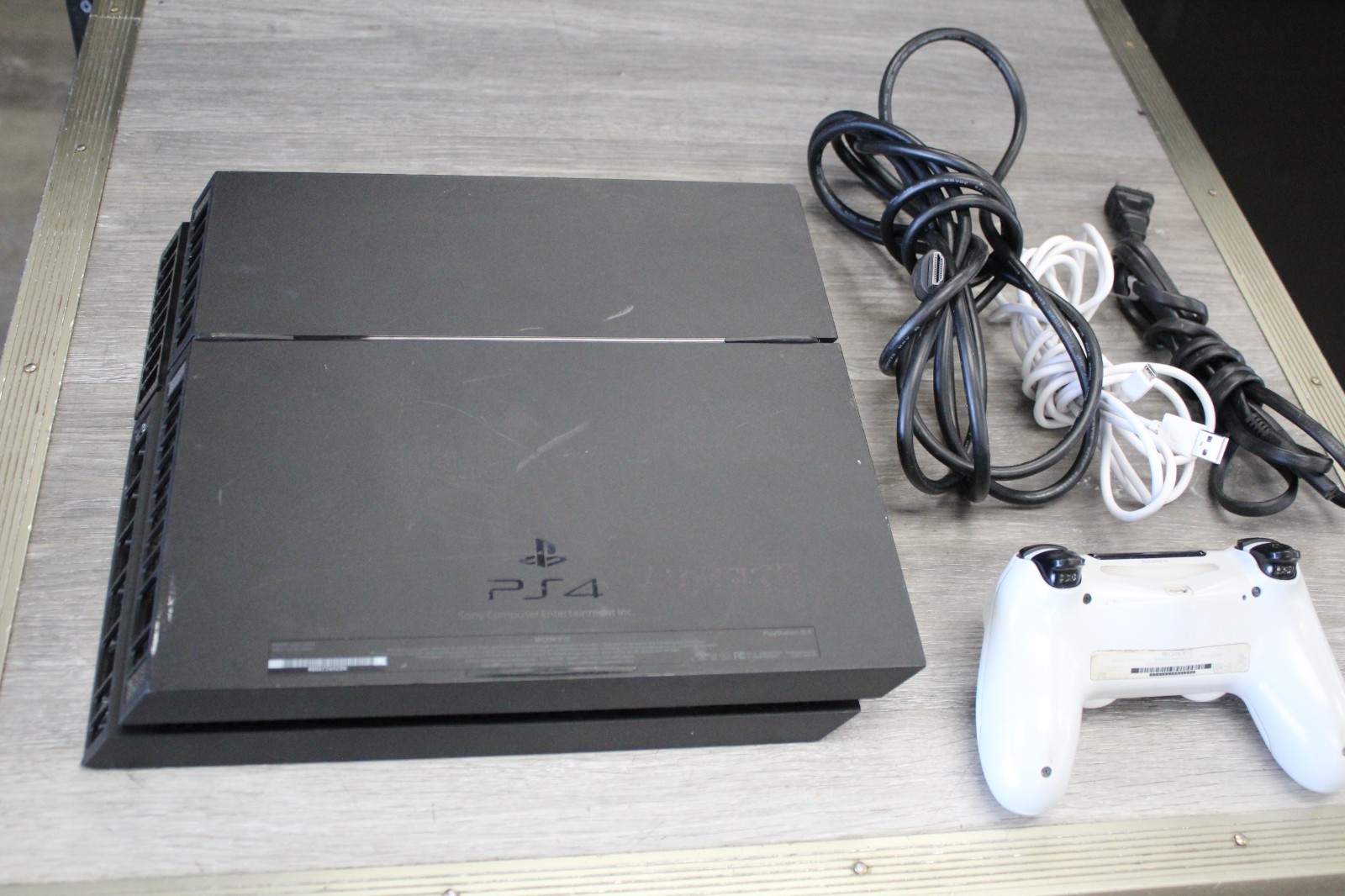 Sony PlayStation 4 500GB Gaming Console -Black (CUH-1001A) with White Controller