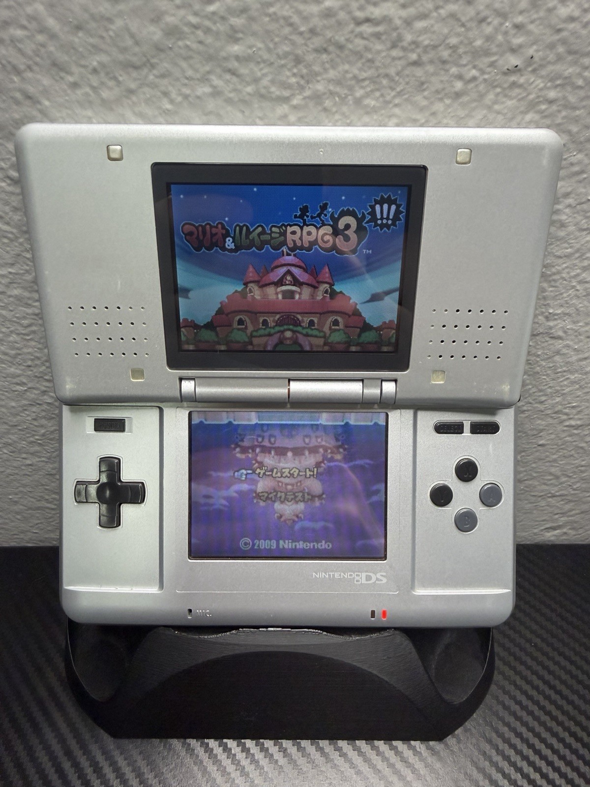 Original DS Handheld Silver With Stylus Charger And Game Tested And Working
