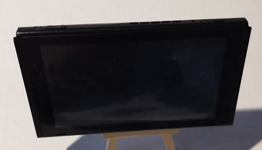 NINTENDO SWITCH W/ JOYCONS SERIAL # XAW10092373791 W/ CHARGER