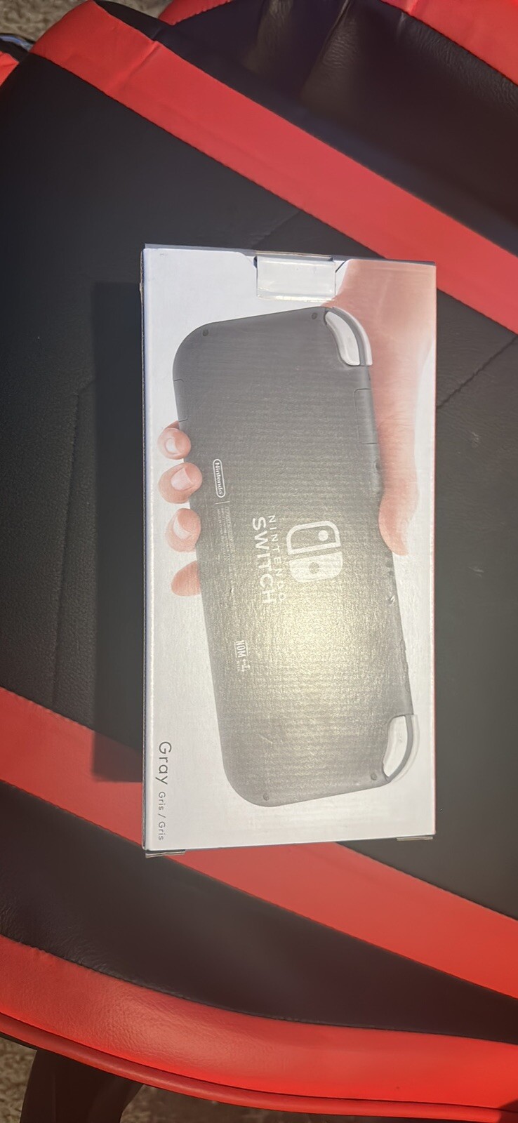 Nintendo Switch Lite Gray Handheld System with clear grip case