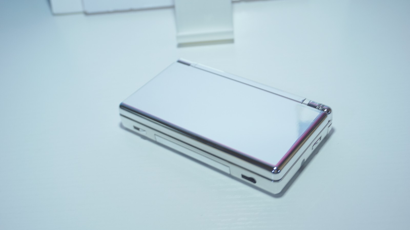 Nintendo DS Lite Metallic Chrome Silver Mirror Handheld Game System w/ Charger